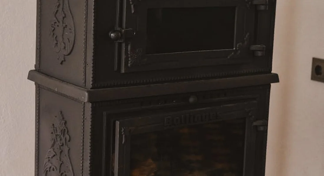 Vintage cast-iron wood stove in a home setting